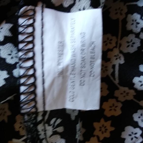 Short sleeved wrap around dress ties in the back. - Picture 5 of 5